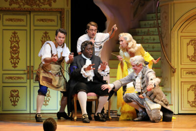 Rosina in The Barber of Seville at Santa Fe Opera with L to R: Joshua Hopkins, Nicolas Newton, Jack Swanson, and Kevin Burdette (Photo: Curtis Brown)